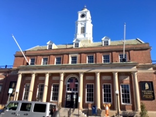 Plymouth Post Office building with brick facade, columns and clock tower fuller restored with help of federal tax credits